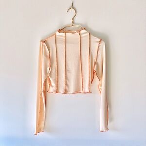 Cute and Fun Cream and Orange Women's Long Sleeve Crop Top